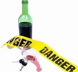 Cariati Law Toronto, Ontario Injury Lawyers Drunk Driving Wine Glass with Car Keys and Caution Tape