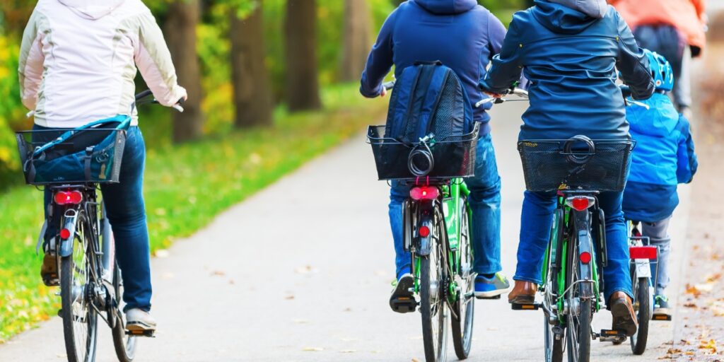 family biking in Hamilton, when a car struck the father and they need a personal injury law firm