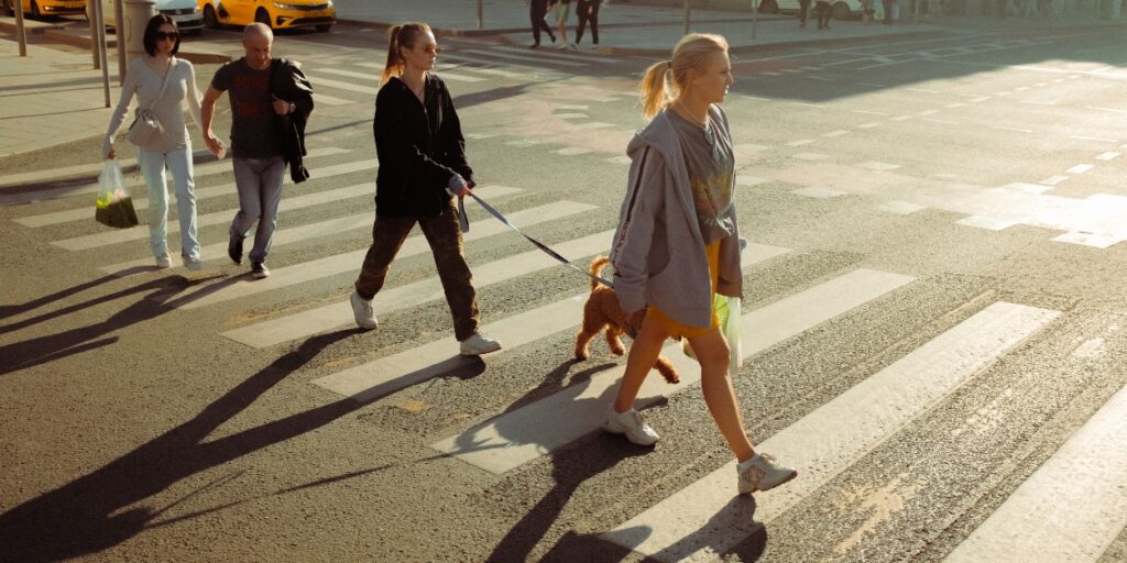 Pedestrians crossing the street in Mississauga. Pedestrian accidents happen much more in larger cities.