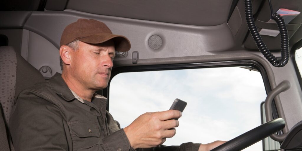 truck driver texting and driving and got in 18 wheeler accident in Ontario