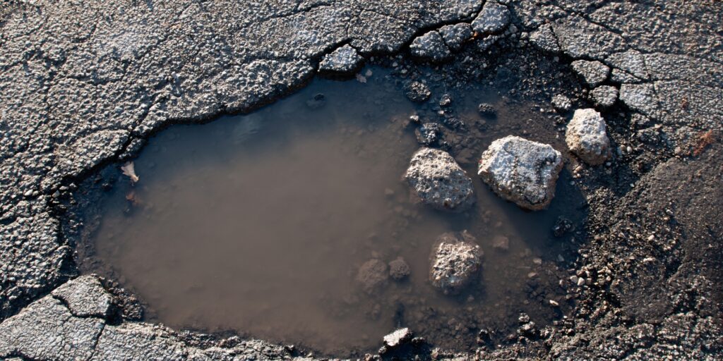 a big pothole in a Mississauga parking lot caused injury in a Slip and Fall Injury Claim